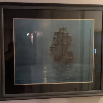 Framed Print of Famous Maritime Oil Painting "The Crescent Moon" by British artist Montague Dawson
