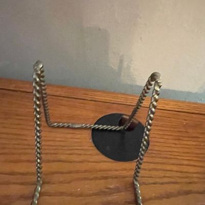 Sale Photo Thumbnail #592: Gold Twisted Metal Display Stand