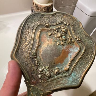 Sale Photo Thumbnail #299: Vintage Art Nouveau Silver-Plated Hand Mirror with Floral Repoussé