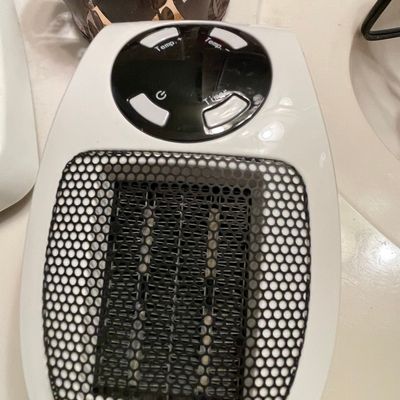Sale Photo Thumbnail #575: Wall Outlet Ceramic Space Heater with Remote