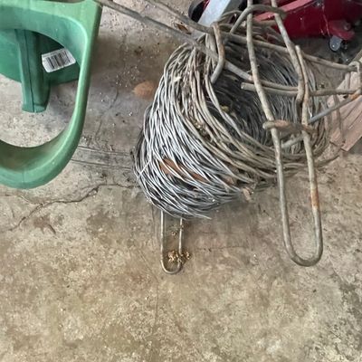 Sale Photo Thumbnail #210: Vintage Barbed Wire Coil with Wire Stretcher Tool
