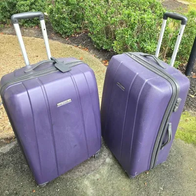 2 Delsey Hard Case Suitcases