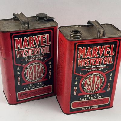 Sale Photo Thumbnail #396: Pair Vtg Marvel Mystery Oil Tin Cans