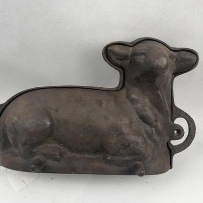 Sale Photo Thumbnail #232: A Two-Piece Cast Iron Lamb Cake Mold