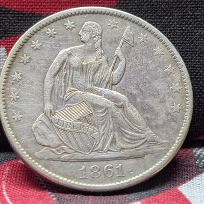 Sale Photo Thumbnail #170: XF - 1861-O w/ Drapery Seated Liberty 90% Silver Half Dollar