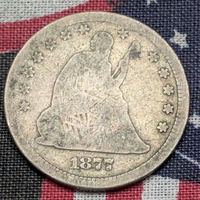 Sale Photo Thumbnail #421: 1877 Seated Liberty 90% Silver Quarter
