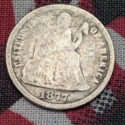 Sale Photo Thumbnail #444: 1877-CC w/ Legend Seated Liberty 90% Silver Dime