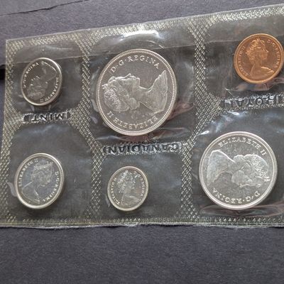 Sale Photo Thumbnail #330: 1966 Canada Unc. Coin Set with (4) 80% Silver Coins in OGP w/ COA