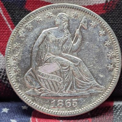 Sale Photo Thumbnail #184: AU/UNC - 1865 w/ Drapery Seated Liberty 90% Silver Half Dollar