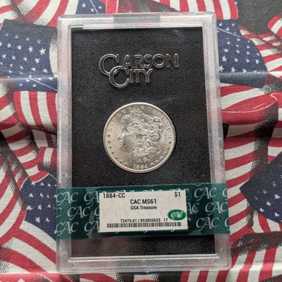 Sale Photo Thumbnail #379: 1884-CC Morgan 90% Silver Dollar - CAC Cert. MS61 - GSA Treasure