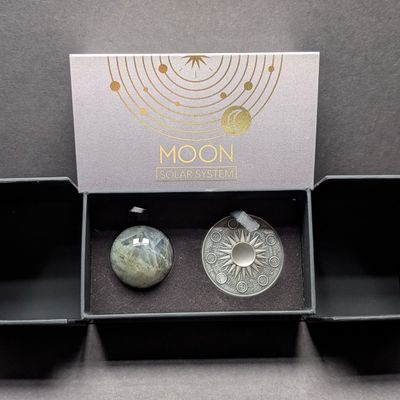 Sale Photo Thumbnail #240: Limited Edition HIGH RELIEF Antique Finish Solar System 2 Oz. .999 FINE SILVER 2025 Republic of Ghana 10 Cedis Moon (Waxing Cresent) Coin in Display Box w/ COA - Includes Labradorite Crystal Sphere (Planet Replica)