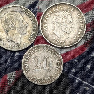 Sale Photo Thumbnail #375: 1938 Colombia 90% Silver 10 Centavos 2.5g, 1874-B Germany 90% Silver 20 Pfennig 1.111g, & 1885 Spain 83.5% Silver 10 Centavos 2.5g