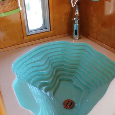 Custom Tiki Style Micro Travel Trailer (sink)