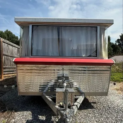Sale Photo Thumbnail #21: Holiday House Travel Trailer (front)