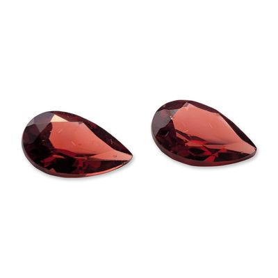 Sale Photo Thumbnail #460: A Pair of Pear-Cut Red Garnets