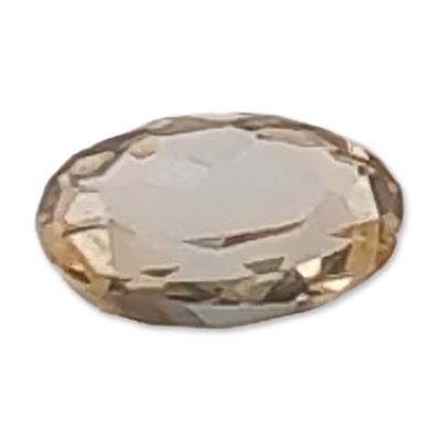 Sale Photo Thumbnail #230: Oval Pale Champagne Faceted Topaz Gemstone