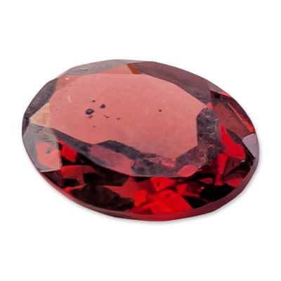 Sale Photo Thumbnail #136: Oval Faceted Red Gemstone