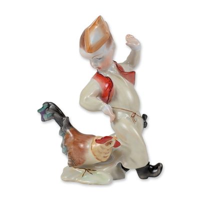 Sale Photo Thumbnail #575: Herend Hungarian Porcelain Boy and Rooster Figurine