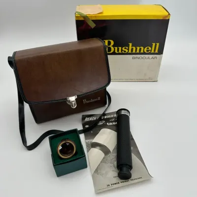 Bushnell 7x50 Binoculars, Tasco Pocket Telescope, and Van Cort Instruments Dragonfly Magnifier Set