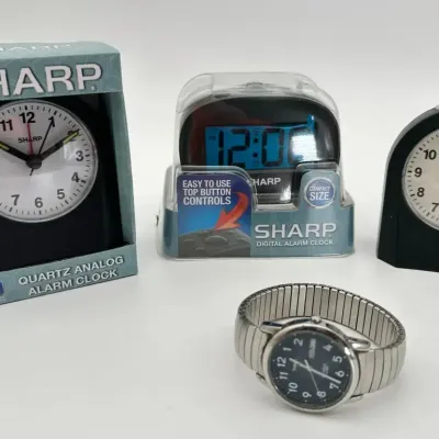 Timex Indiglo Wristwatch and Sharp Alarm Clocks