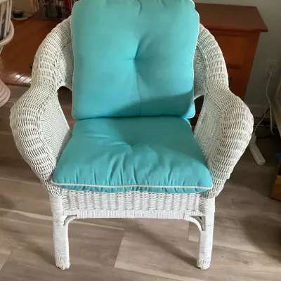 White Wicker Armchair With Light Teal Cushions