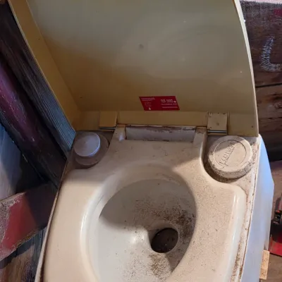 Montgomery Ward Tote lite composting toilet bowl and a folding shovel - great prepping item