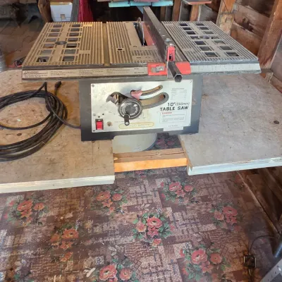 Chicago Electric 10" table saw mounted on vintage chrome legged framica table
