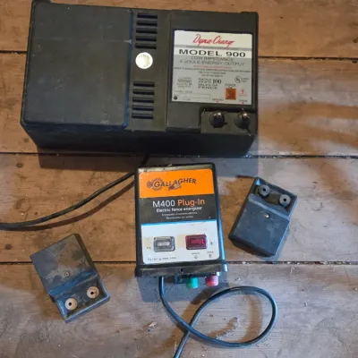 Two electric fence chargers - Dyna charge Model 900 and Gallagher M400 plug-in