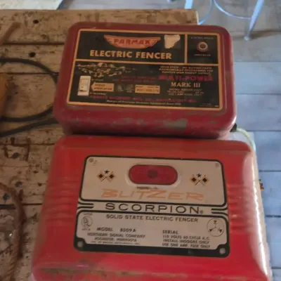 Two electric fence chargers- Paramax Mark III and a Blitzer Scorpion Model 8509 A