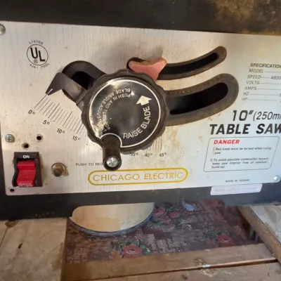 Chicago Electric 10" table saw mounted on vintage chrome legged framica table