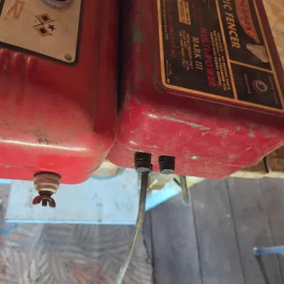 Two electric fence chargers- Paramax Mark III and a Blitzer Scorpion Model 8509 A