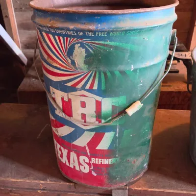 Two vintage metal buckets