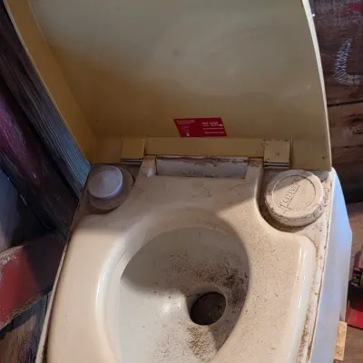 Montgomery Ward Tote lite composting toilet bowl and a folding shovel - great prepping item