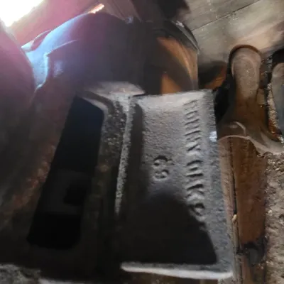 Antique cast-iron "oak-style" pot-belly stove, which reads "BONNY OAK" on the upper front door - appears complete and...