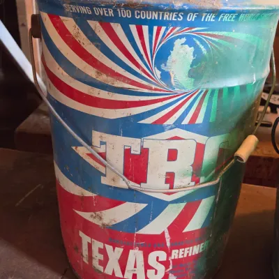 Two vintage metal buckets