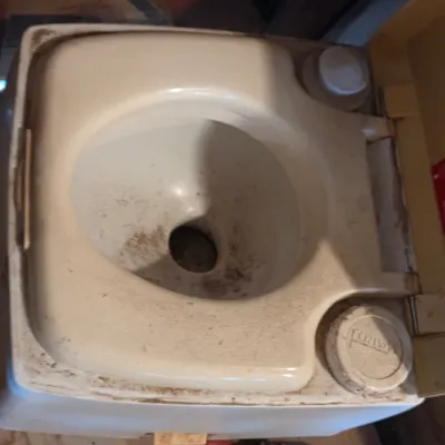 Montgomery Ward Tote lite composting toilet bowl and a folding shovel - great prepping item