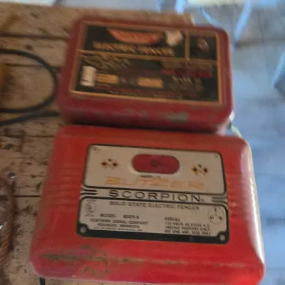 Two electric fence chargers- Paramax Mark III and a Blitzer Scorpion Model 8509 A