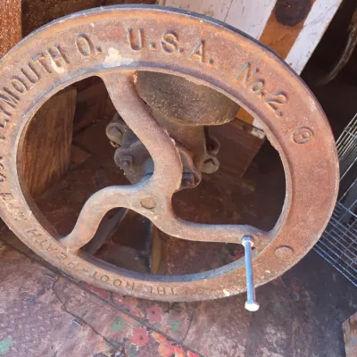 Antique Root-Heath Mfg. Co. "Korn King" No. 2 cast iron grist and corn mill, featuring a hand-crank flywheel marked with...