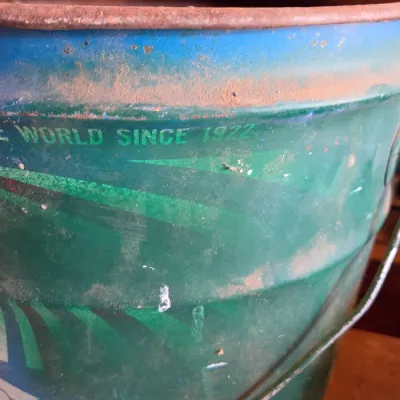 Two vintage metal buckets