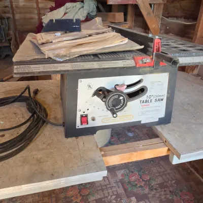 Chicago Electric 10" table saw mounted on vintage chrome legged framica table