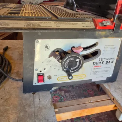 Chicago Electric 10" table saw mounted on vintage chrome legged framica table