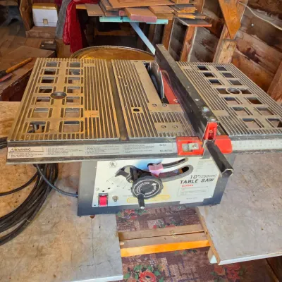 Chicago Electric 10" table saw mounted on vintage chrome legged framica table