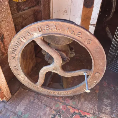 Antique Root-Heath Mfg. Co. "Korn King" No. 2 cast iron grist and corn mill, featuring a hand-crank flywheel marked with...
