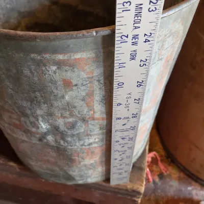 Two vintage metal buckets