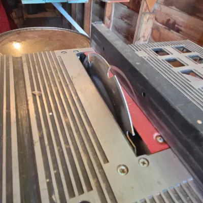 Chicago Electric 10" table saw mounted on vintage chrome legged framica table