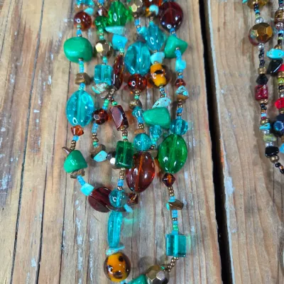 Two new beaded necklaces with matching earrings