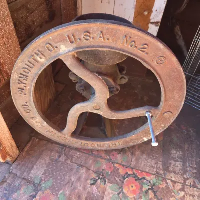 Antique Root-Heath Mfg. Co. "Korn King" No. 2 cast iron grist and corn mill, featuring a hand-crank flywheel marked with...