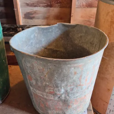 Two vintage metal buckets