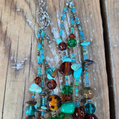 Two new beaded necklaces with matching earrings