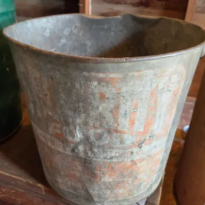 Two vintage metal buckets